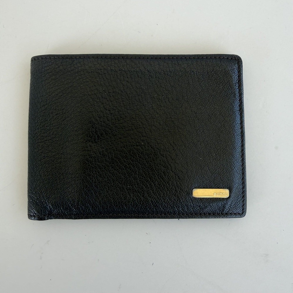 Gucci Vintage Men's Black Grained Leather Bi-Fold Wallet with Gold Logo Plaque